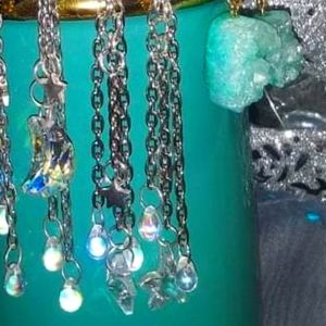 (SOLD) Crystal Star dangle earings.